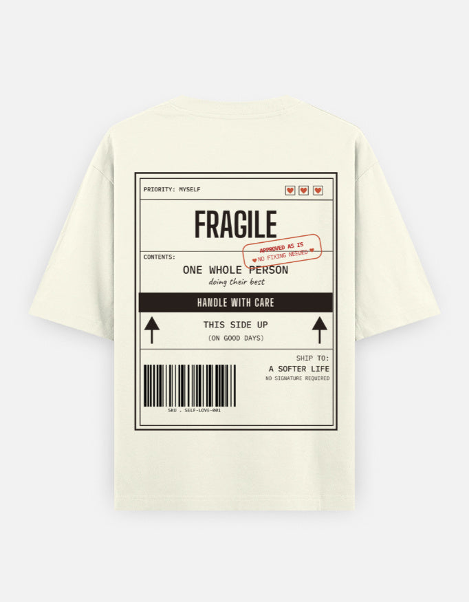 Fragile Handle With Care label-style print on unisex heavyweight oversized t-shirt