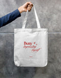 Busy Impressing Myself confidence quote printed on cotton canvas tote bag