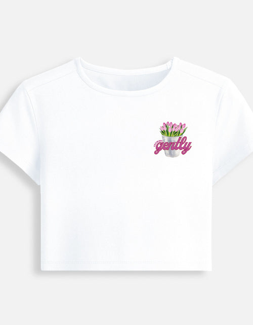Growing Gently self-growth quote printed on soft cropped baby tee