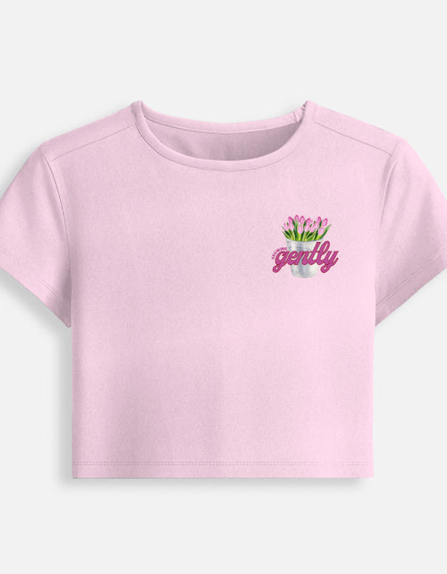 Growing Gently self-growth quote printed on soft cropped baby tee