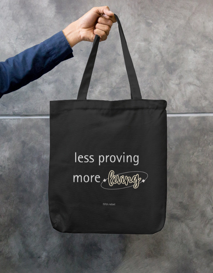 Less Proving More Living minimalist quote printed on cotton canvas tote bag